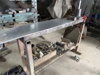 124 · Heavy duty bench 1700 x 400 including contents