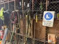 143 · Various items to outside cage including lifting sl