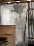 195 · Assorted checker plate and steel plate to wall