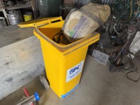 Wheelie bin with spill kit bag