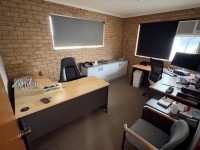 235 · Contents of front office including two L-shaped de