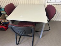 41 · Grey melamine table with 3 x maroon chairs