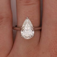 94 · 3 CARATS PEAR DIAMOND SOLITAIRE RING IGI PLATINUM