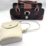 A PAIR OF DESIGNER HANDBAGS