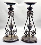 172 · A PAIR OF ANTIQUE CANDLE HOLDERS